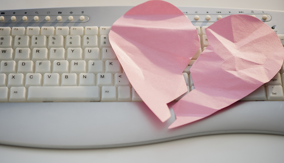 lose up of broken heart on computer keyboard