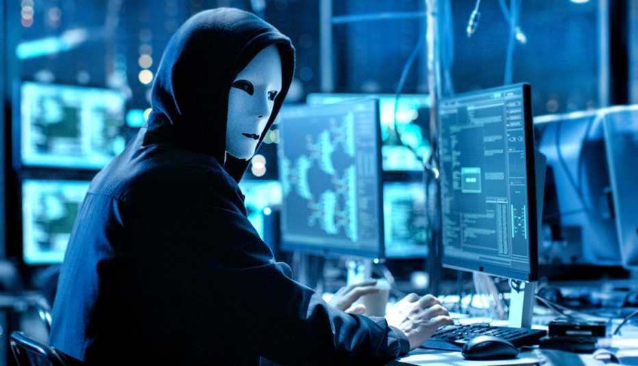 scammer working on computers