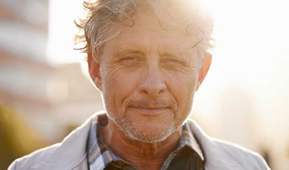 An up-close portrait shot of a middle-aged man